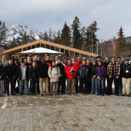 Emergent behavior in multi-particle systems with non-local interactions, Banff, 2012